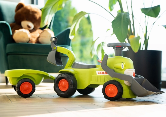 Tracteur roulant Claas avec remorque, chargeur et pelle