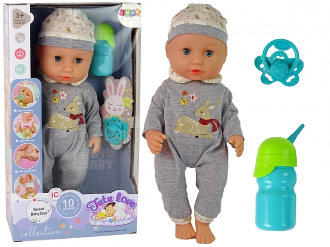 Poupon Poupée en Pyjama Gris avec Sons et Accessoires