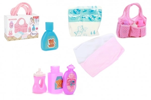 Sac pour poupées avec accessoires en plastique dans une boîte en plastique 17x12x7cm