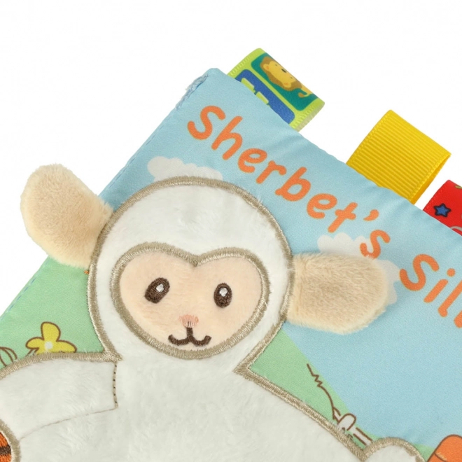 Livre sensoriel pour bébé avec un mouton et des étiquettes