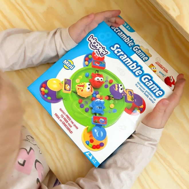 Jeu amusant de grenouilles joyeuses et crocodiles affamés