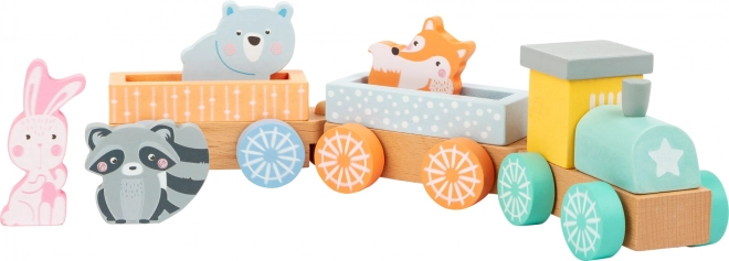 Petit train en bois aux couleurs pastel