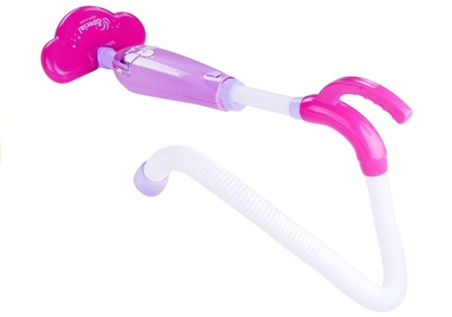 Aspirateur rose pour enfants à piles avec deux embouts