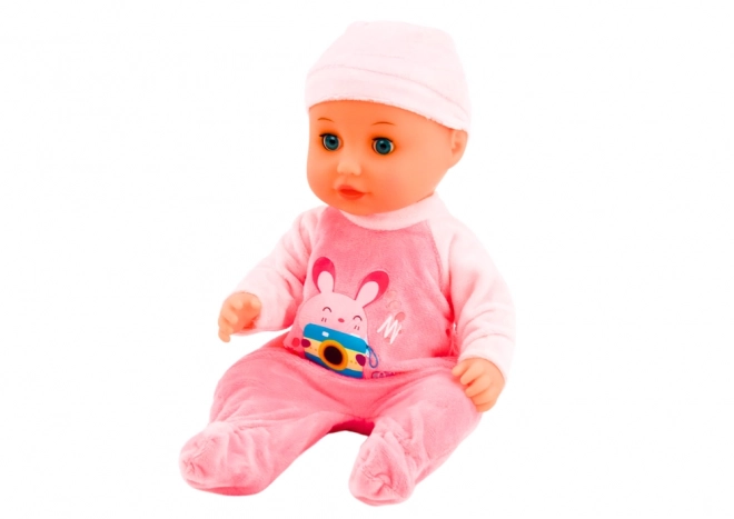 Poupée bébé avec vêtements roses et effets sonores