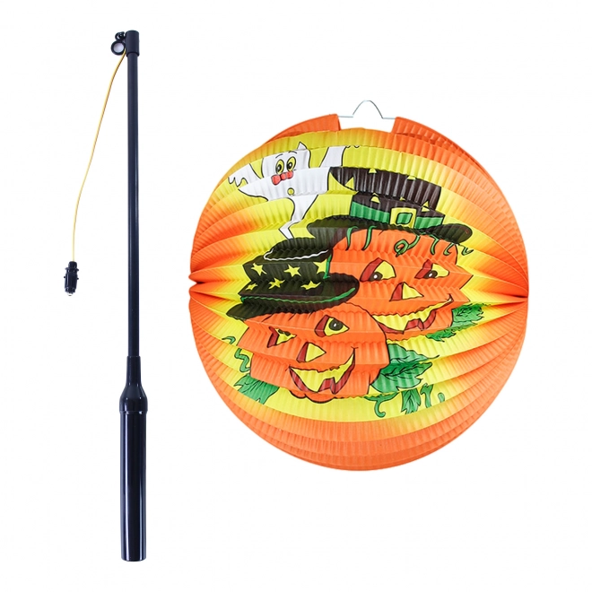 Lampion Halloween citrouille joyeuse 15 cm avec bâton lumineux 40 cm