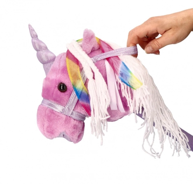 Licorne à bascule sur bâton Rosa