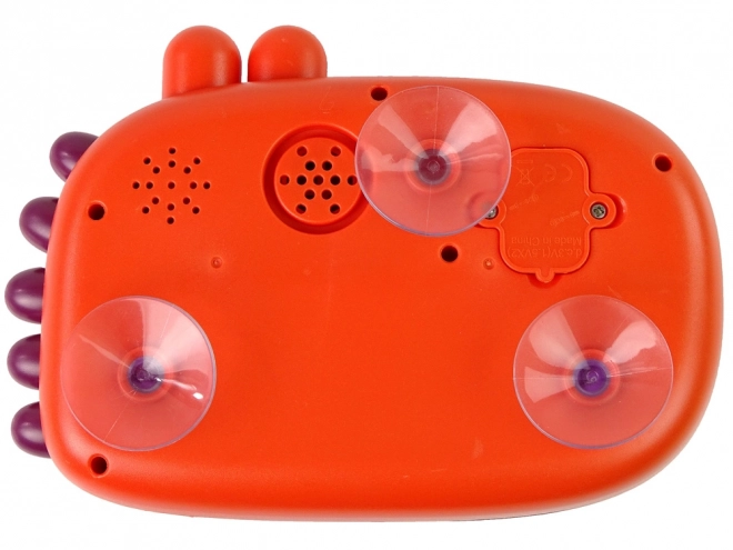 Jouet pour le bain Dino – générateur de bulles rouge à piles