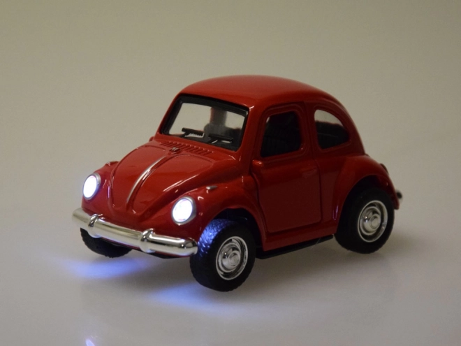 Voiture en métal avec portes ouvrantes et phares