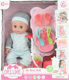 Poupée bébé qui fait pipi avec sons 28 cm avec accessoires