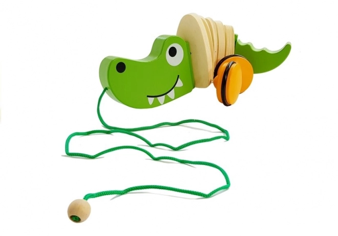 Crocodile en bois sur roulettes 18cm
