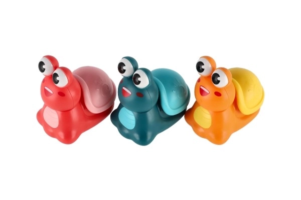 Escargot appuyez et partez plastique 8 cm à inertie 3 couleurs 12 pcs en boîte