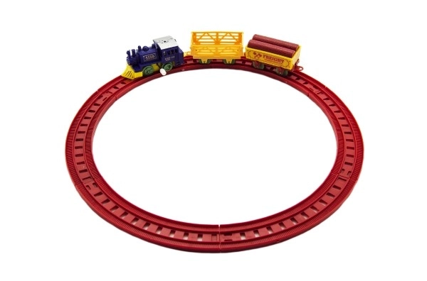 Train à clé avec deux wagons et pistes