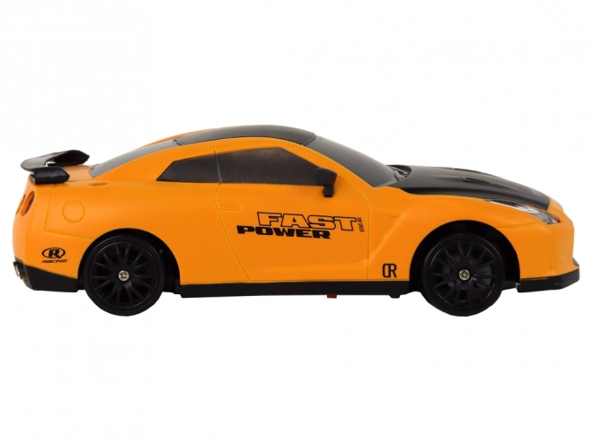 Voiture de sport téléguidée R/C 1:24 avec roues interchangeables – jaune