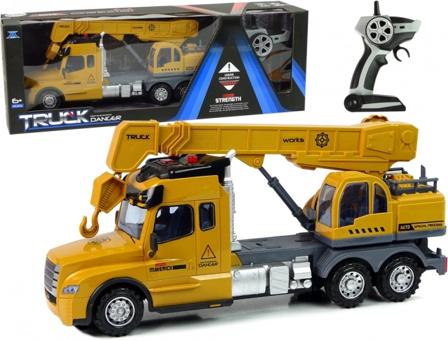 Camion jaune télécommandé avec grue et sons