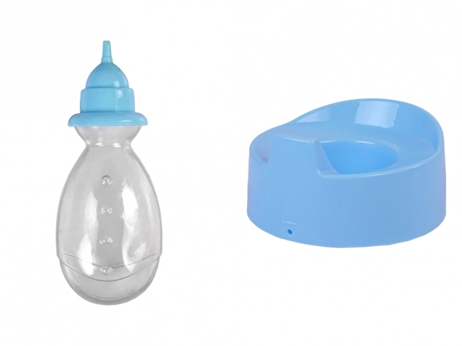 Poupée bébé sur le pot avec un nœud bleu
