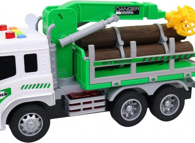 Camion de transport de bois avec bras élévateur et effets lumineux