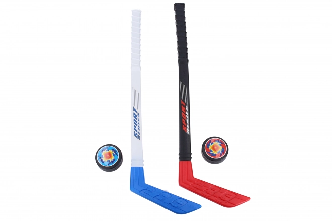 Crosses de hockey enfant avec palets - 57 cm