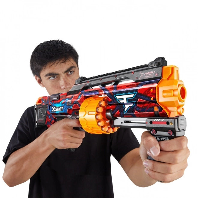 Lanceur X-Shot Skins Last Stand avec 16 fléchettes