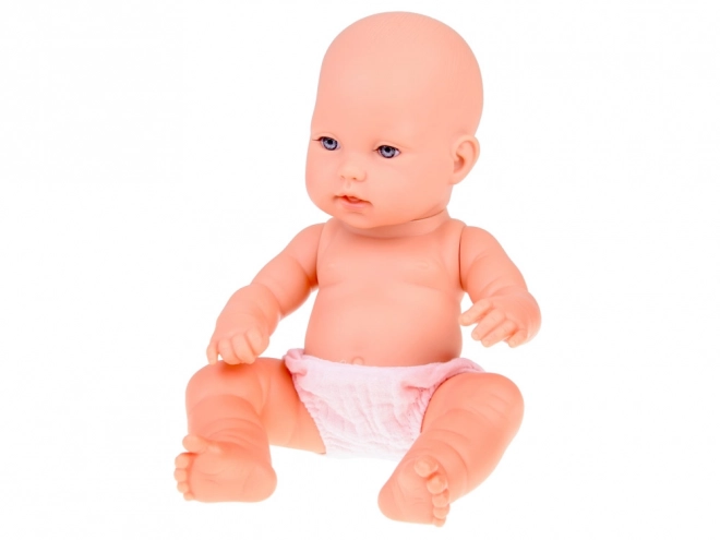 Poupée en tissu bébé nouveau-né avec bonnet rose