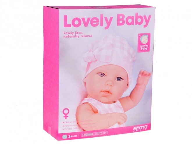 Poupée en tissu bébé nouveau-né avec bonnet rose