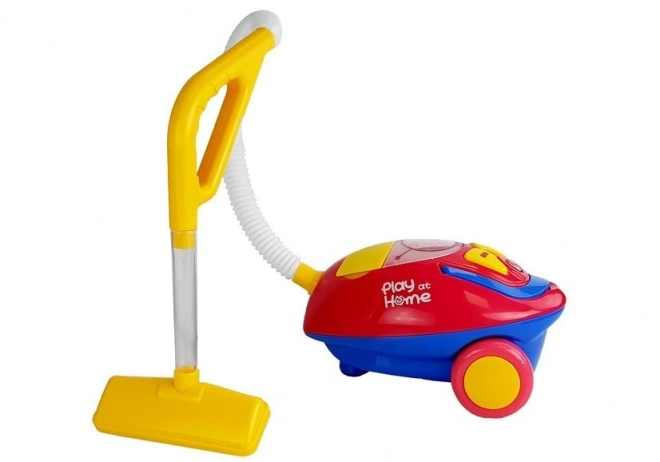 Grand aspirateur rouge et jaune à piles Sons
