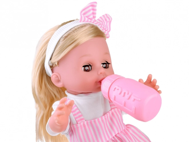 Poupée bébé avec de longs cheveux, parle et pleure