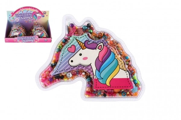 Perles en plastique colorées dans un blister en forme de licorne