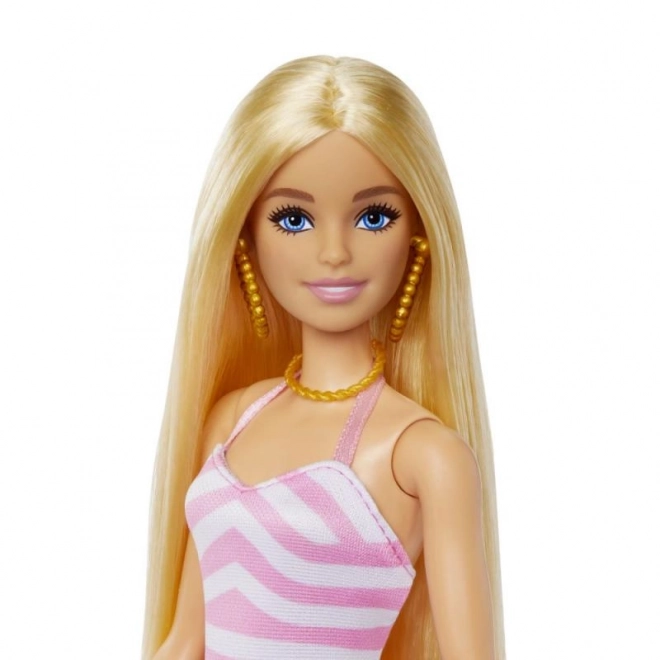 Barbie à la plage avec accessoires d'été