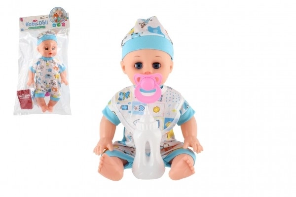 Poupée bébé plastique 32cm corps solide buvant, faisant pipi à piles avec son et accessoires dans un sac