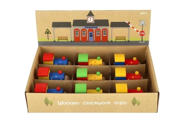 Petit train à clé en bois 7cm ass. 3 couleurs