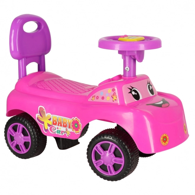Petite voiture rose avec klaxon