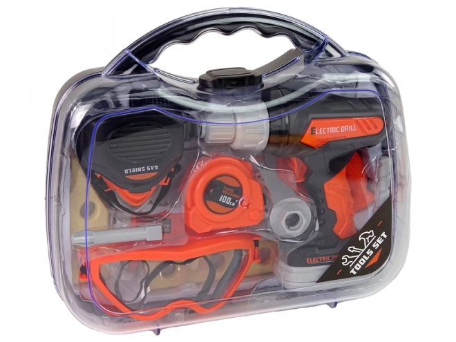Ensemble d'outils avec perceuse électrique et lunettes de protection