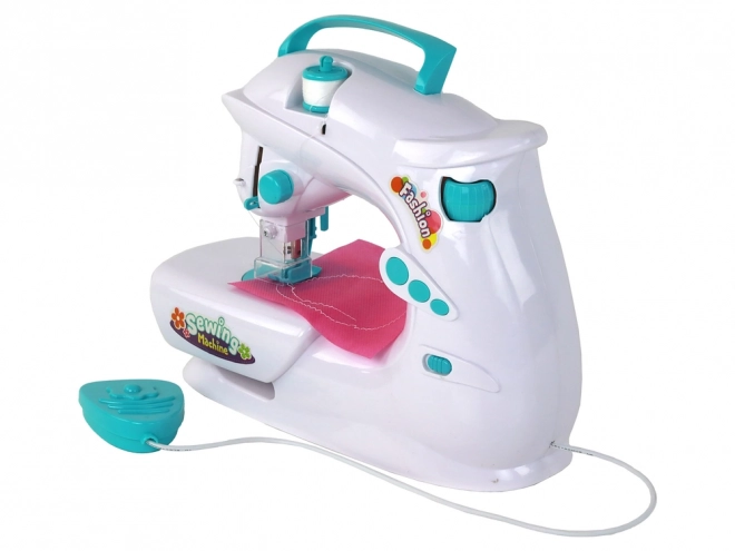 Machine à coudre pour enfants comme une vraie blanche avec piles