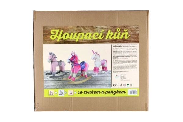Licorne à bascule en peluche blanche avec effets
