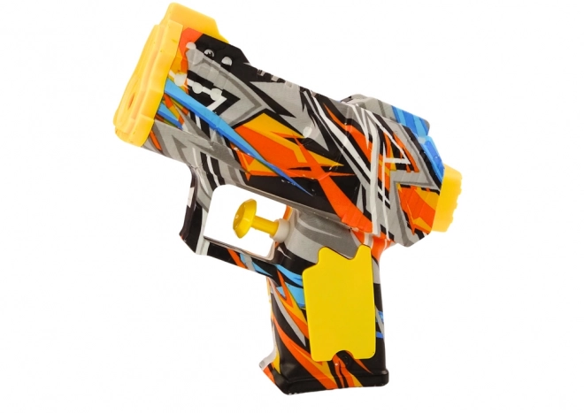 Petite pistolet à eau jaune orange graffiti