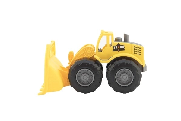 Engin de construction en plastique 18-20cm mix des types en roue libre dans un filet