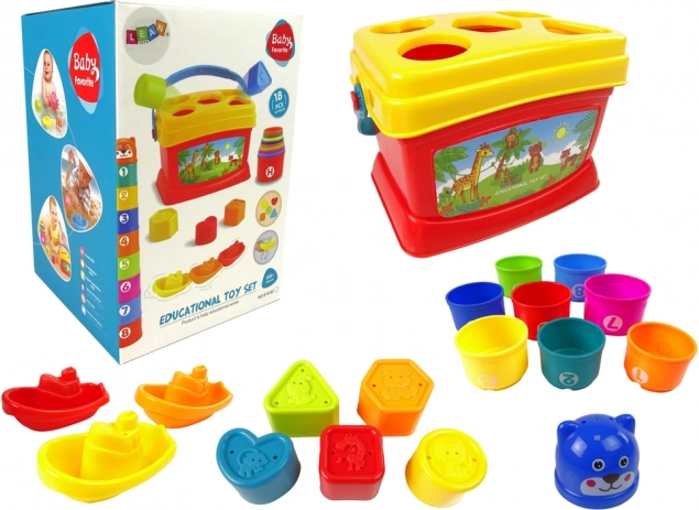 Seau éducatif avec gobelets, pyramide et petits bateaux