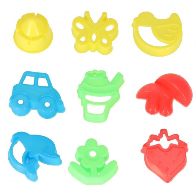 Jouets colorés pour le sable - pelles et moules