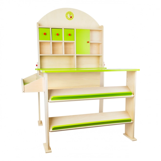 Petit stand de marché vert en bois