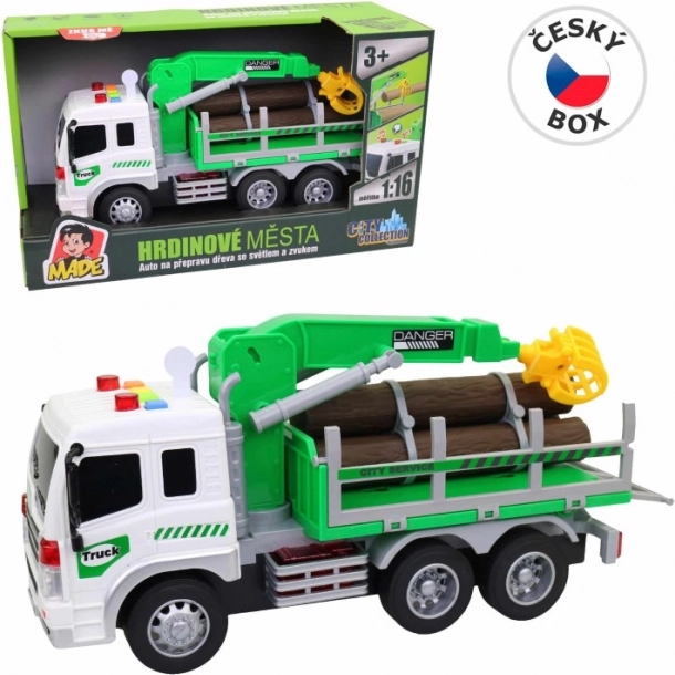 Camion de transport de bois avec bras élévateur et effets lumineux
