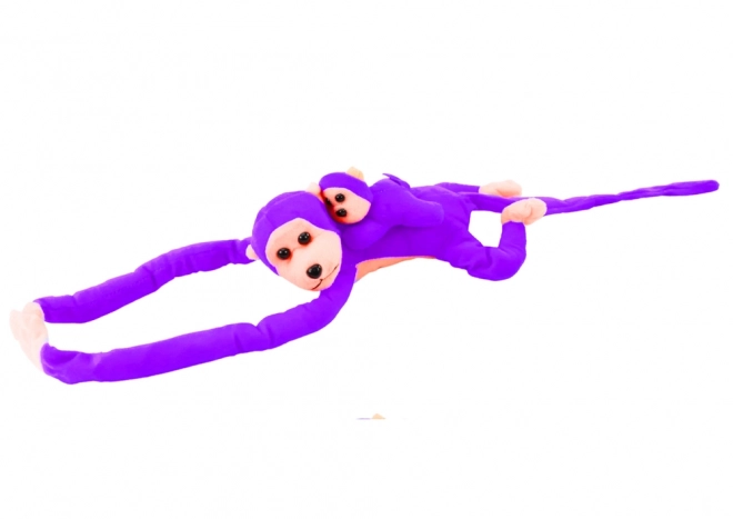 Singe en peluche violet avec bébé
