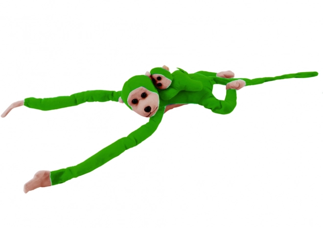 Singe en peluche avec petit vert 70 cm
