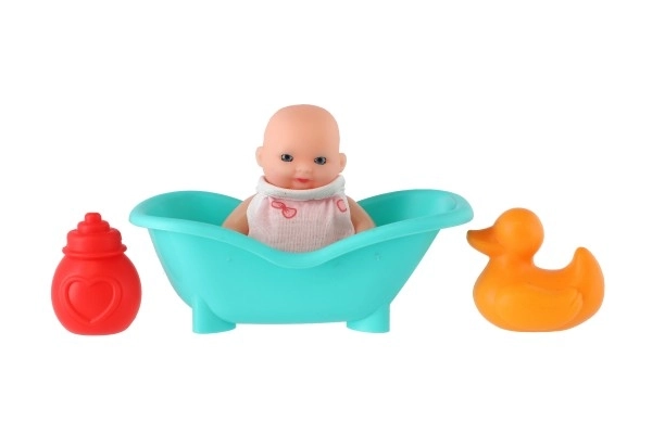 Poupée avec baignoire et accessoires