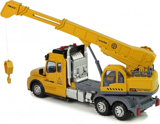 Camion jaune télécommandé avec grue et sons