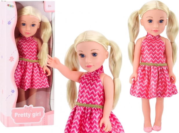 Poupée avec couettes blondes et robe rose 46 cm