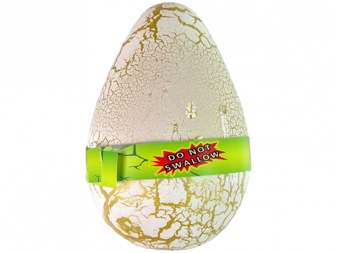 Œuf de dinosaure en croissance 12 cm
