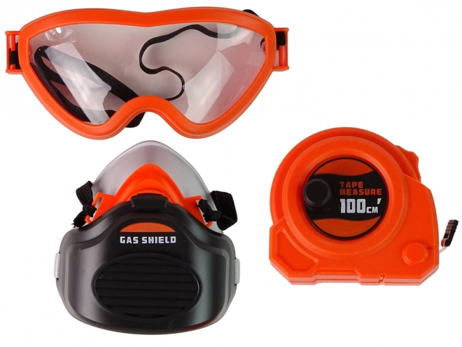 Ensemble d'outils avec perceuse électrique et lunettes de protection