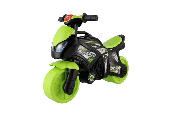 Trottinette moto vert-noir en plastique à batterie avec lumière et son, dans un sac 36x53x74cm