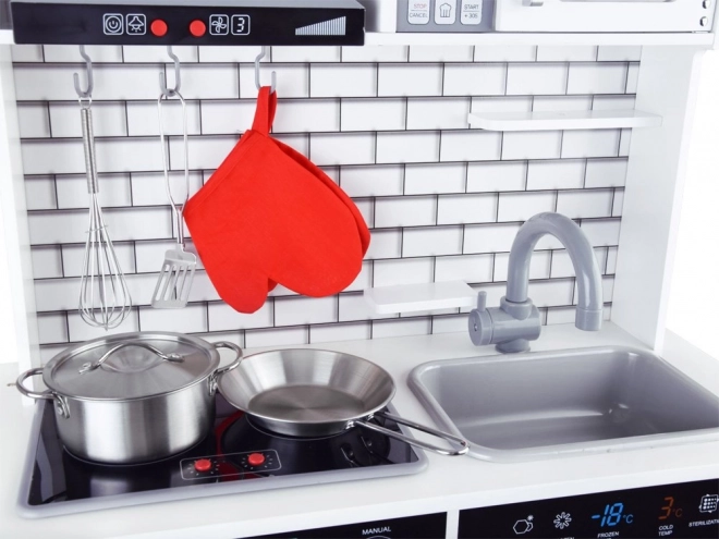 Grande cuisine en bois avec lumières et sons