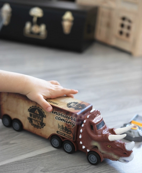 Camion dinosaure avec lanceur et petites voitures